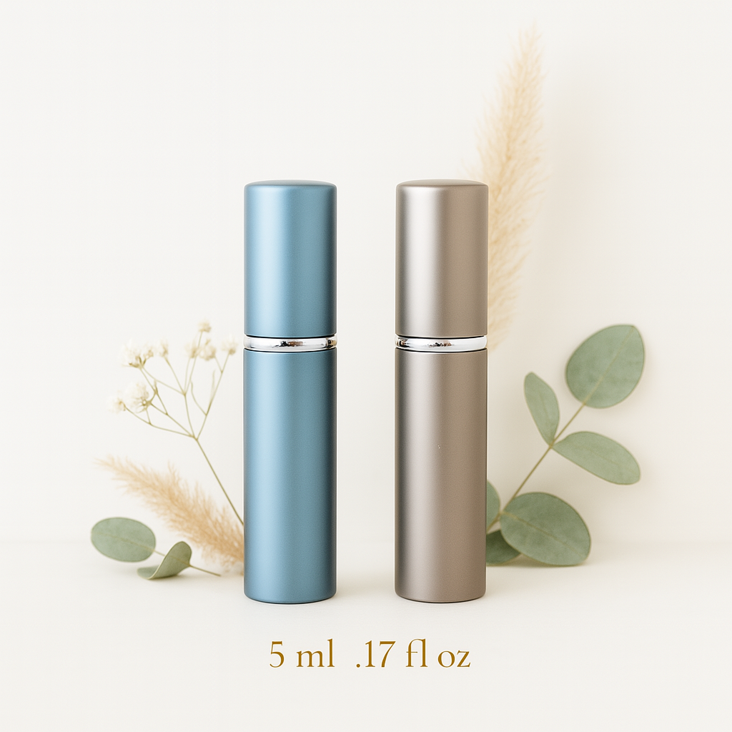 Blue and Brown aluminum travel perfume bottles with a taupe pouch and champagne bow on a light background