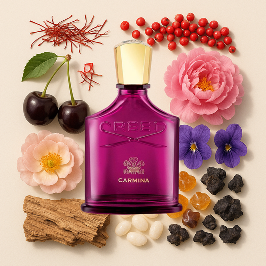 Creed Carmina perfume bottle surrounded by florals, berries, cherries and spices on a beige background. Perfume decants available online. We ship from Greenville, SC.
